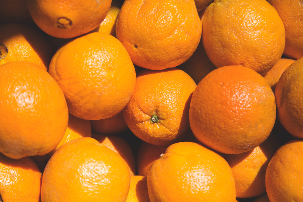 Frische Orangen als natürliche Vitamin-C-Quelle – förderlich für Immunsystem und Hautgesundheit